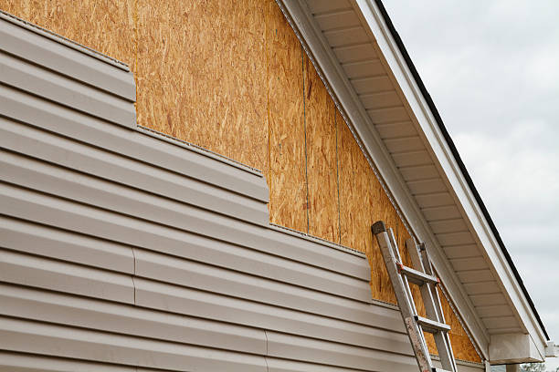Professional Siding Contractor technician working in Allenwood, PA